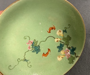 A pair of Chinese famille rose lime green-ground sgraffiato saucer dishes, Qianlong mark and of the period